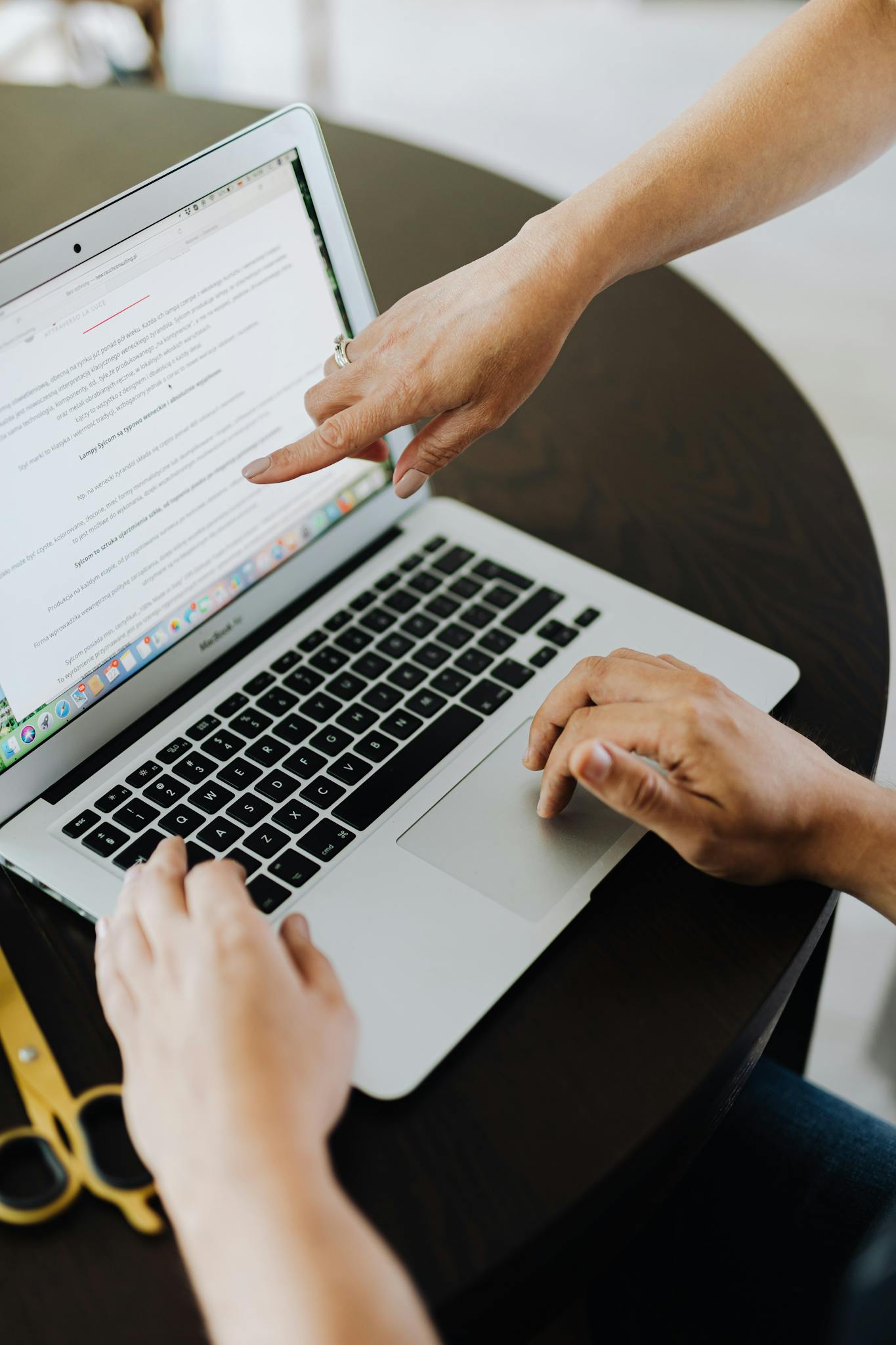 Close-up of a laptop with code on the screen, perfect for illustrating programming concepts.
